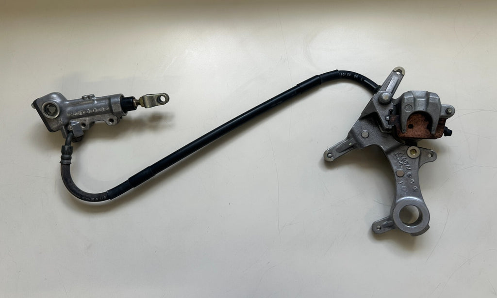 2006 KAWASAKI KX450F REAR BRAKE MASTER CYLINDER  AND CALIPER 