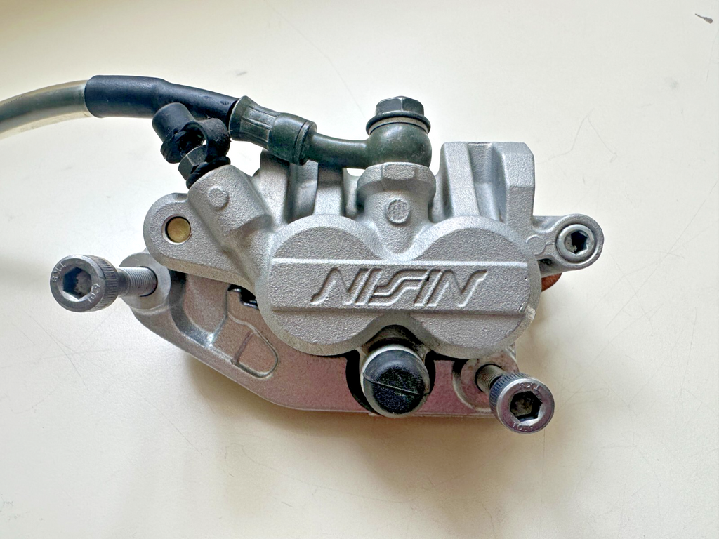 2006 KAWASAKI KX450F FRONT BREAK CALIPER WITH MASTER CYLINDER 
