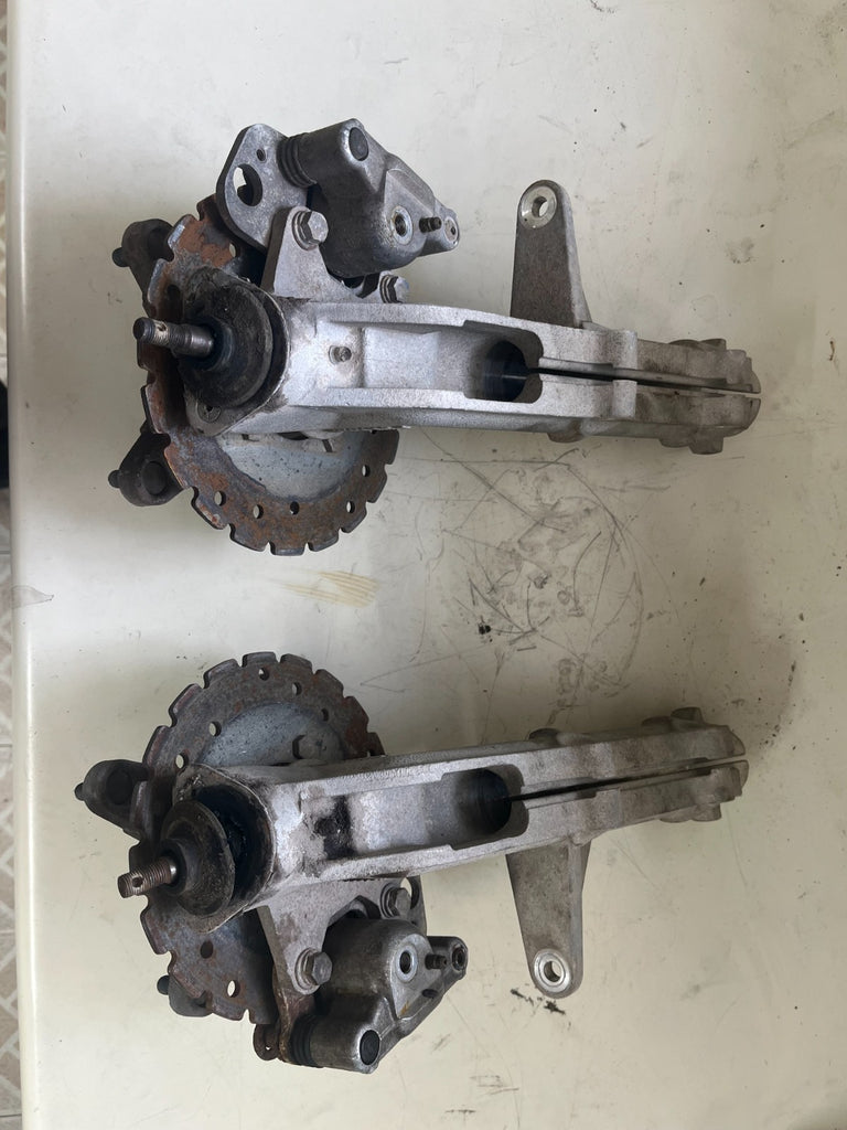 2005 Polaris Trail Blazer Front Spindle Shock Mount with Wheel Hubs