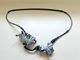 2006 KAWASAKI KX450F FRONT BREAK CALIPER WITH MASTER CYLINDER 