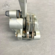 Load image into Gallery viewer, 2009 KTM 144SX Rear Brake Caliper w/ Pads – OEM | Clean &amp; Tested