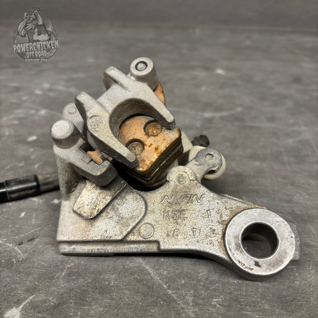 OEM Nissin Honda CRF150R Rear Brake Assembly – Master Cylinder, Caliper, Pedal