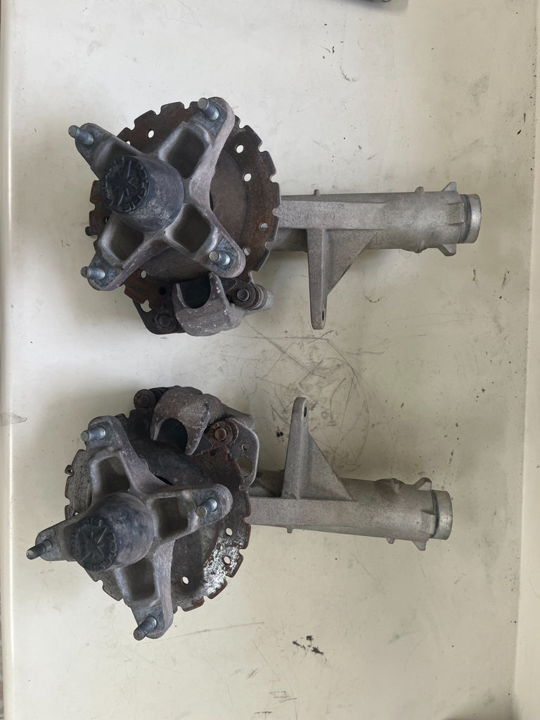 2005 Polaris Trail Blazer Front Spindle Shock Mount with Wheel Hubs