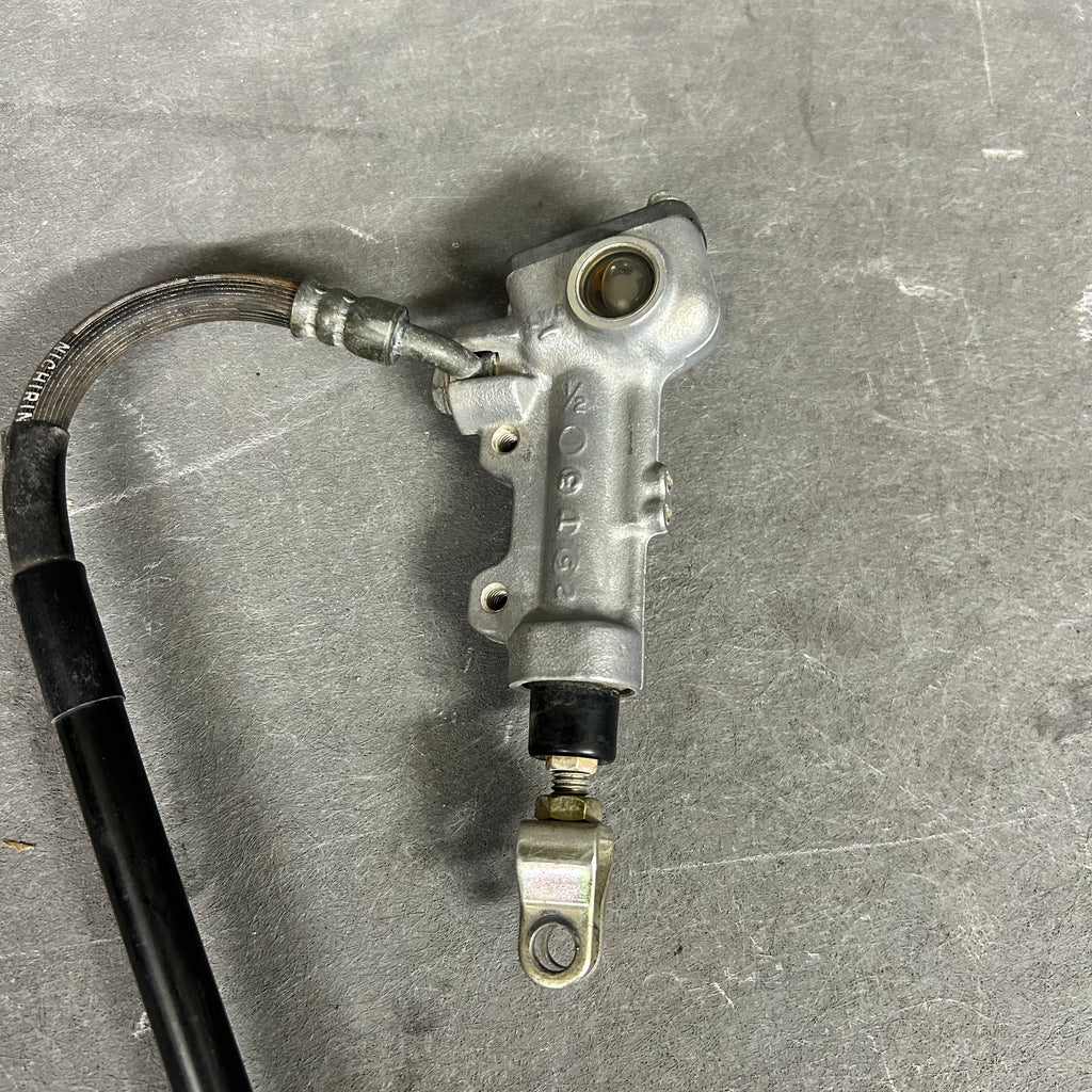 USED 2006 Kawasaki KX-F Rear Brake Assembly 43080-0035 | OEM