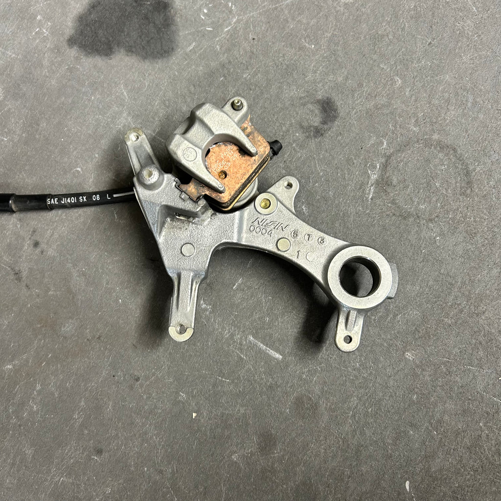 USED 2006 Kawasaki KX-F Rear Brake Assembly 43080-0035 | OEM
