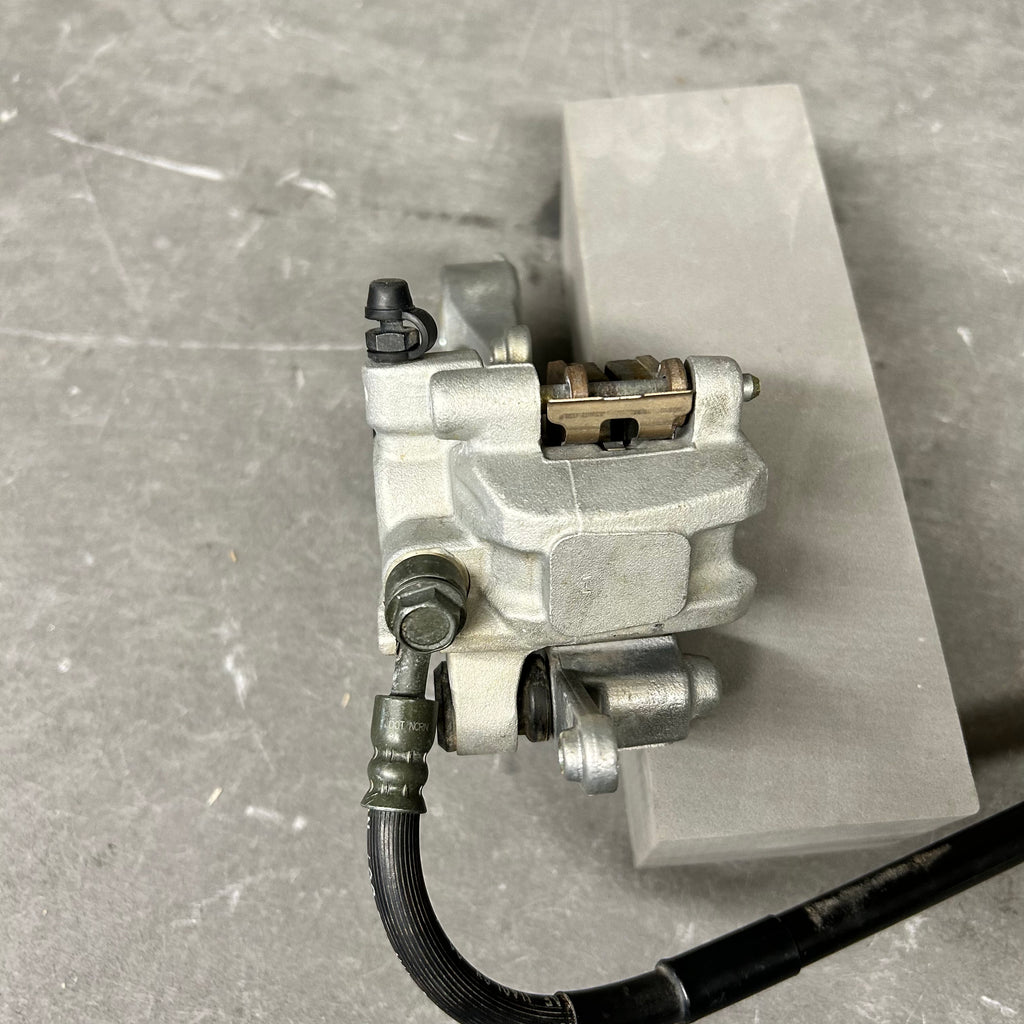 USED 2006 Kawasaki KX-F Rear Brake Assembly 43080-0035 | OEM